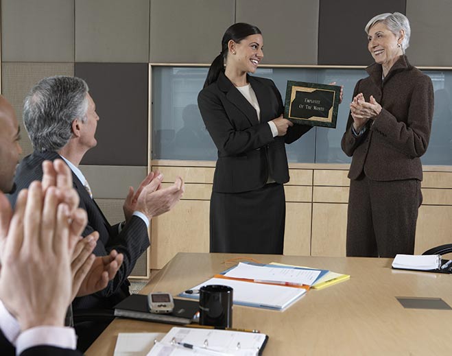 Employee recognition award presentation meeting
