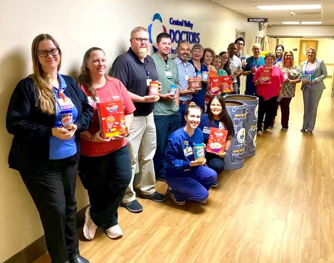 Hospital staff participating in food drive
