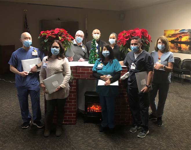 Healthcare staff recognition during holiday appreciation event